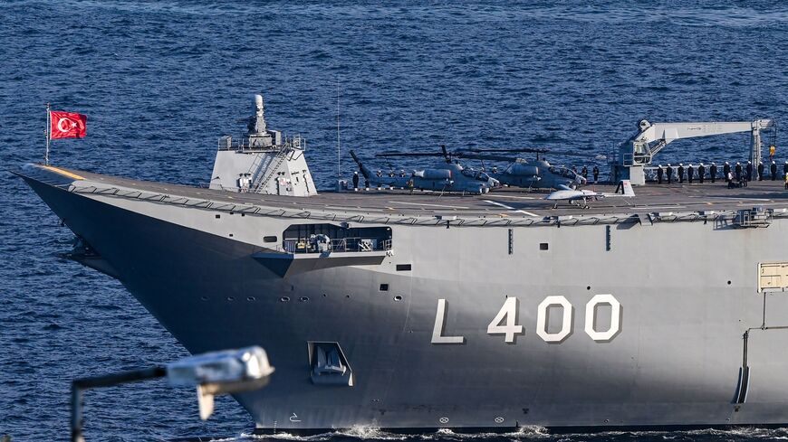 This photo taken on Oct. 29, 2023, in Istanbul shows a Bayraktar TB-2 drone and helicopters on the Turkish navy's L-400 Anadolu warship, during a naval military parade on the Bosphorus to mark the 100th anniversary of the Turkish Republic.